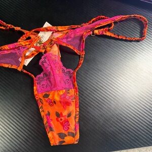 Orange flower Victoria’s Secret Thong Size Medium NWT